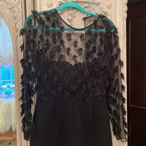 black romper with cute detail